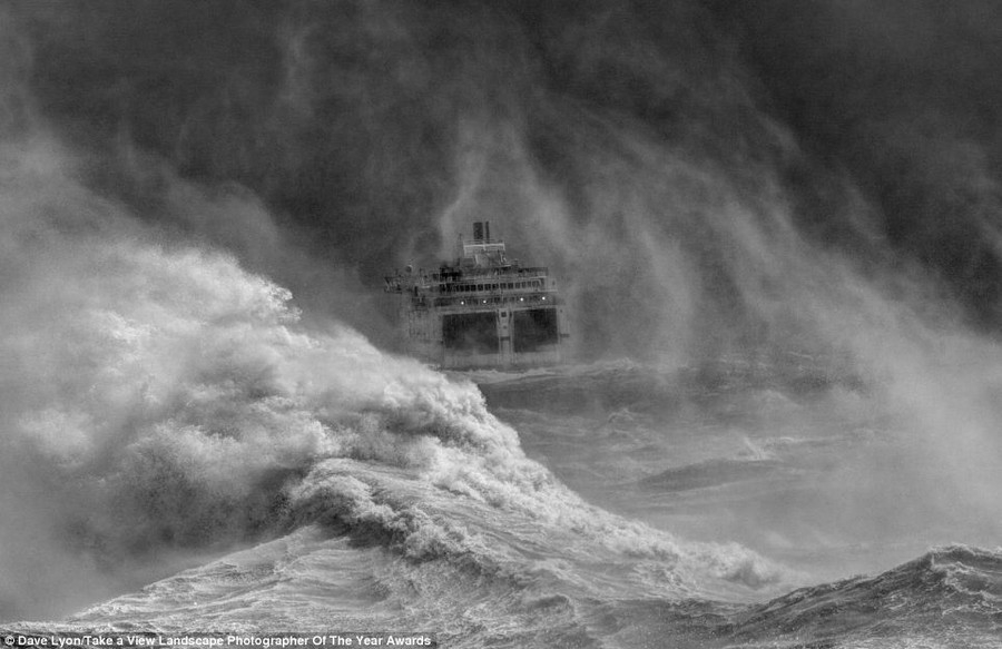 Stormy seas: David Lyon's image of a Ferry leaving Newhaven harbour in storm, East Sussex, won the Your View category in the Take a View - Landscape Photographer of the Year Awards